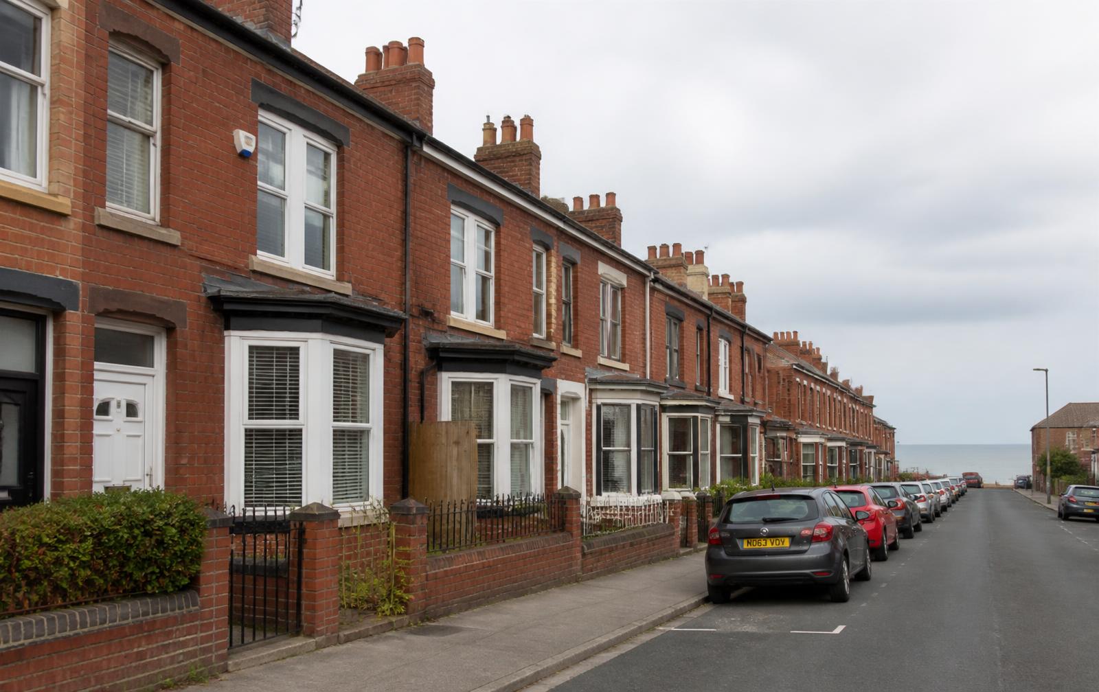 A row of brick terraced houses typical of the properties surveyed for wall tie corrosion